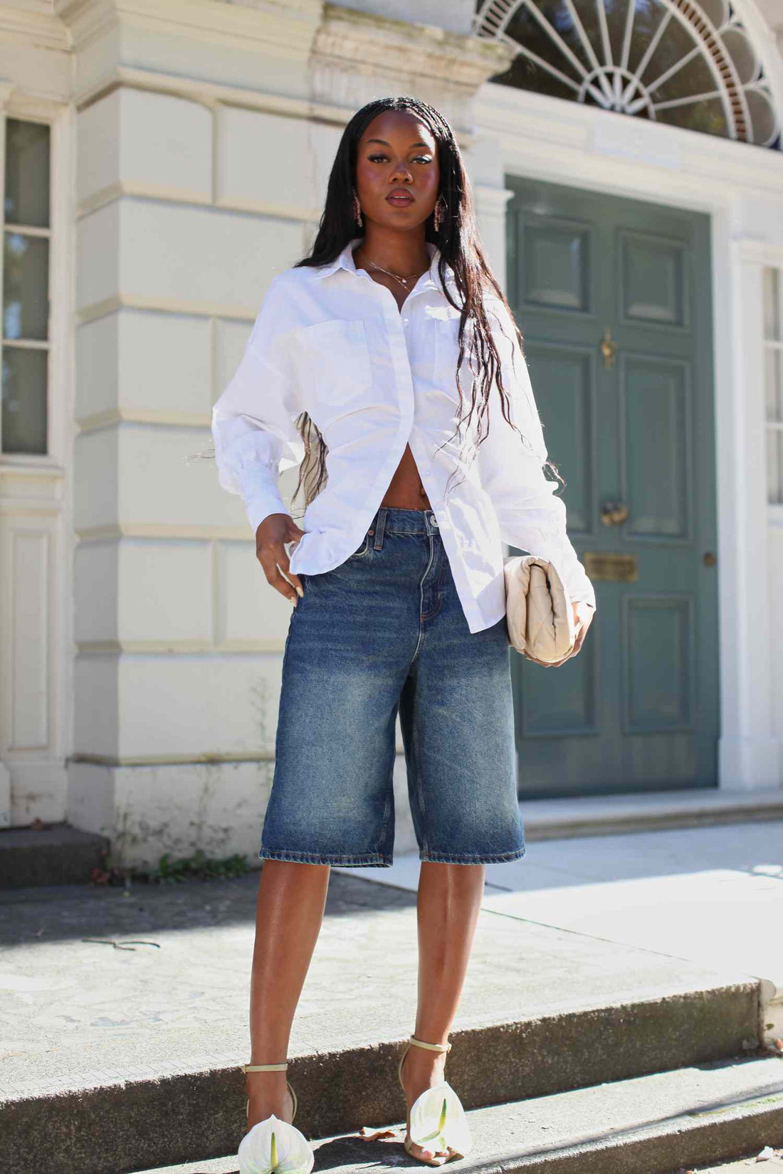 Button-down shirt styled as a streetwear power move with bold graphic tee for 2026 fashion